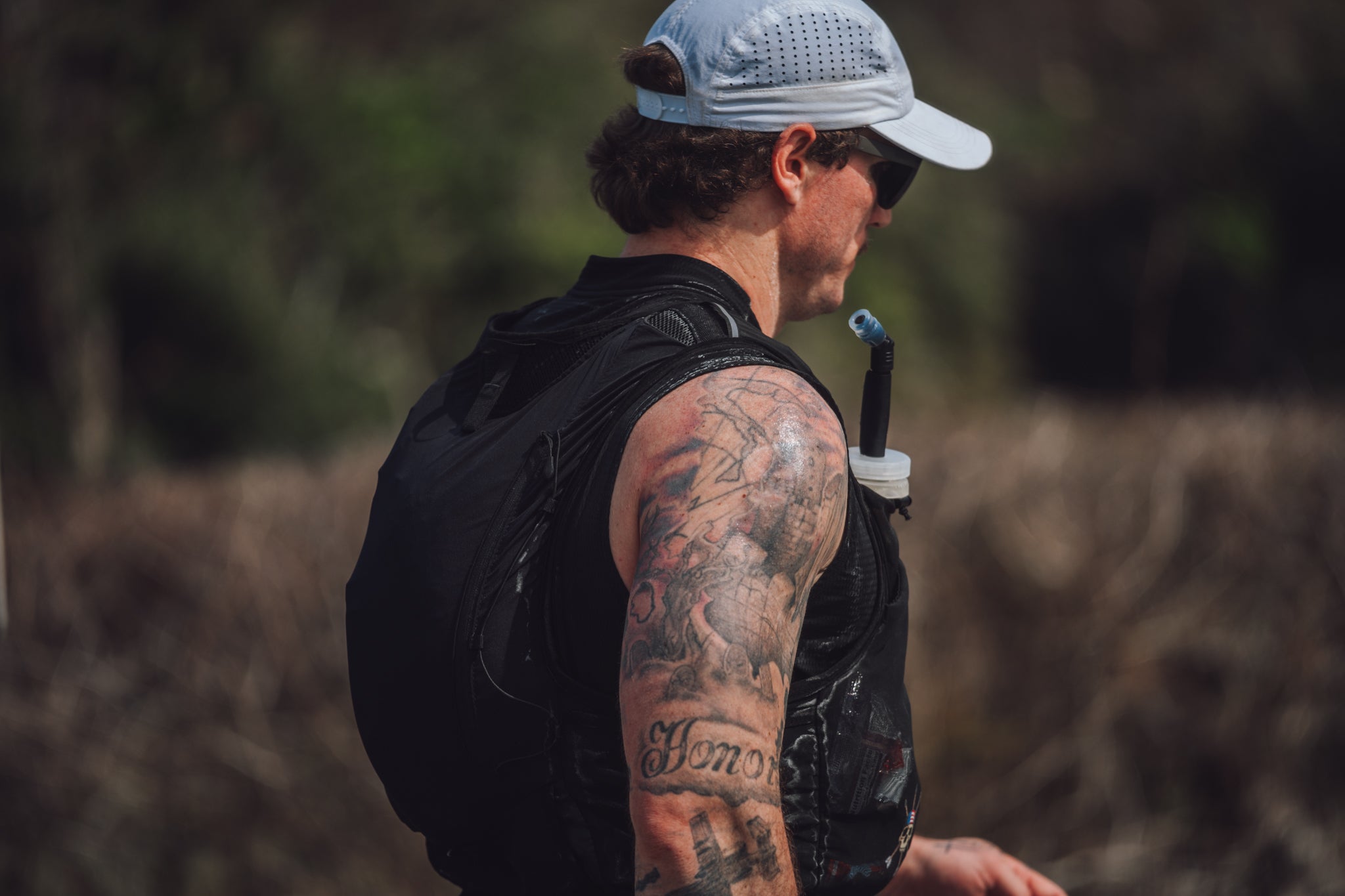 Drinking from the chest flask on course