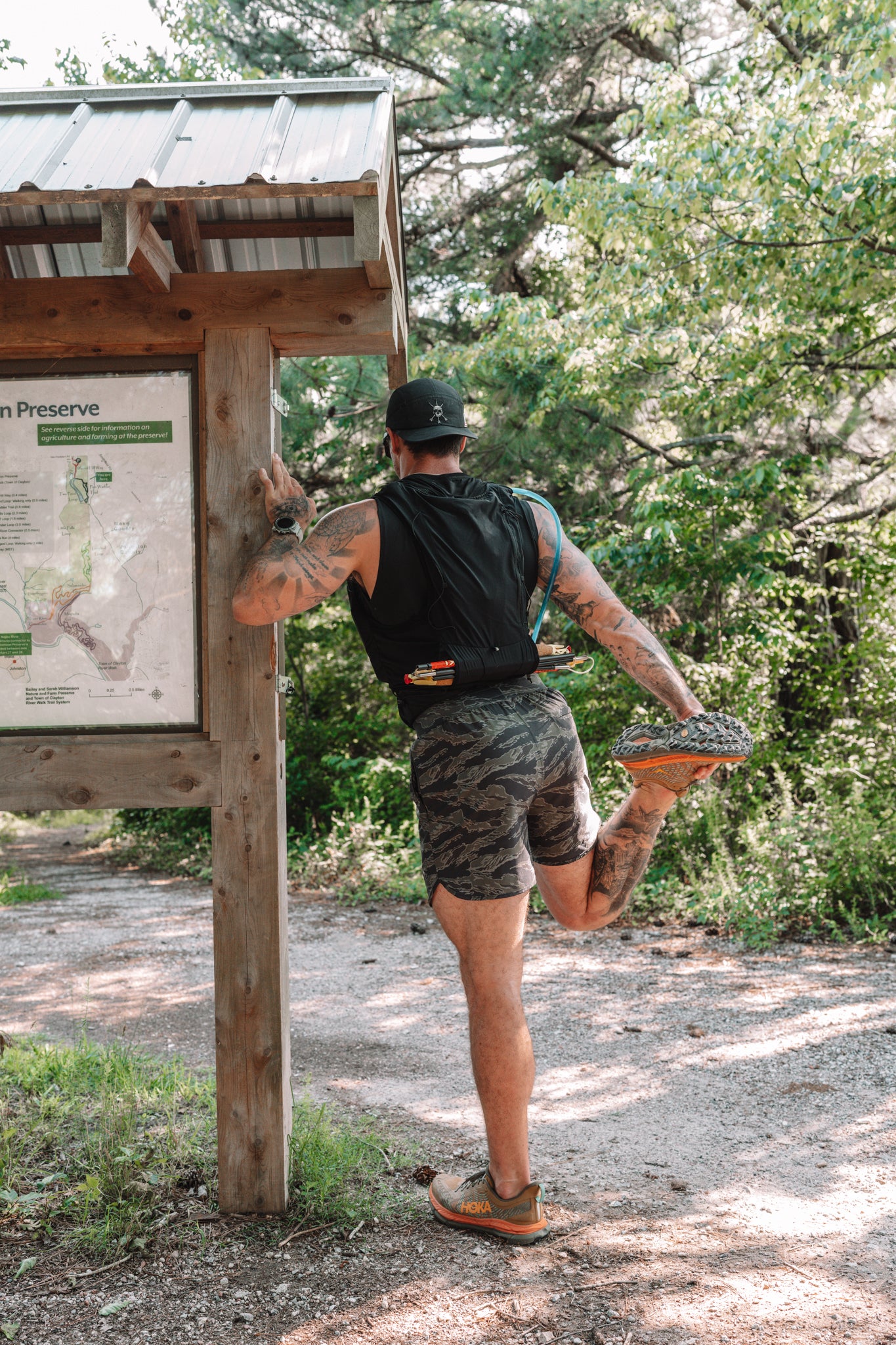 Stretching out at the trailhead board before the run
