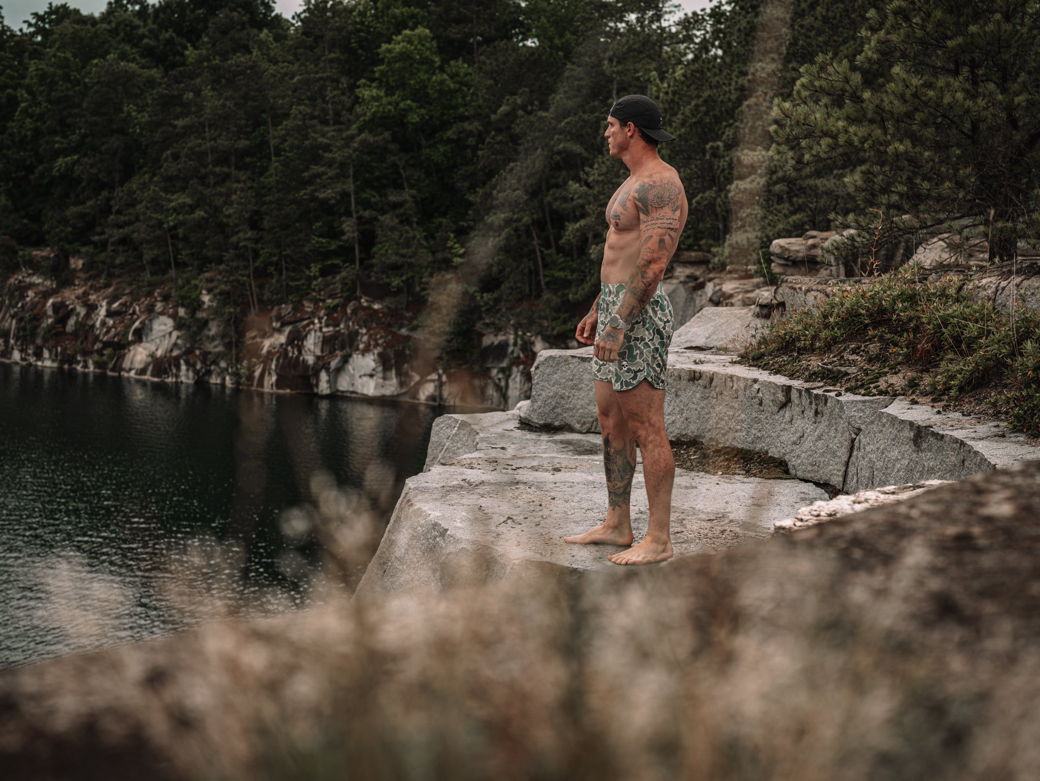 Frogskin Hybrid Short on the granite ledge at the quarry