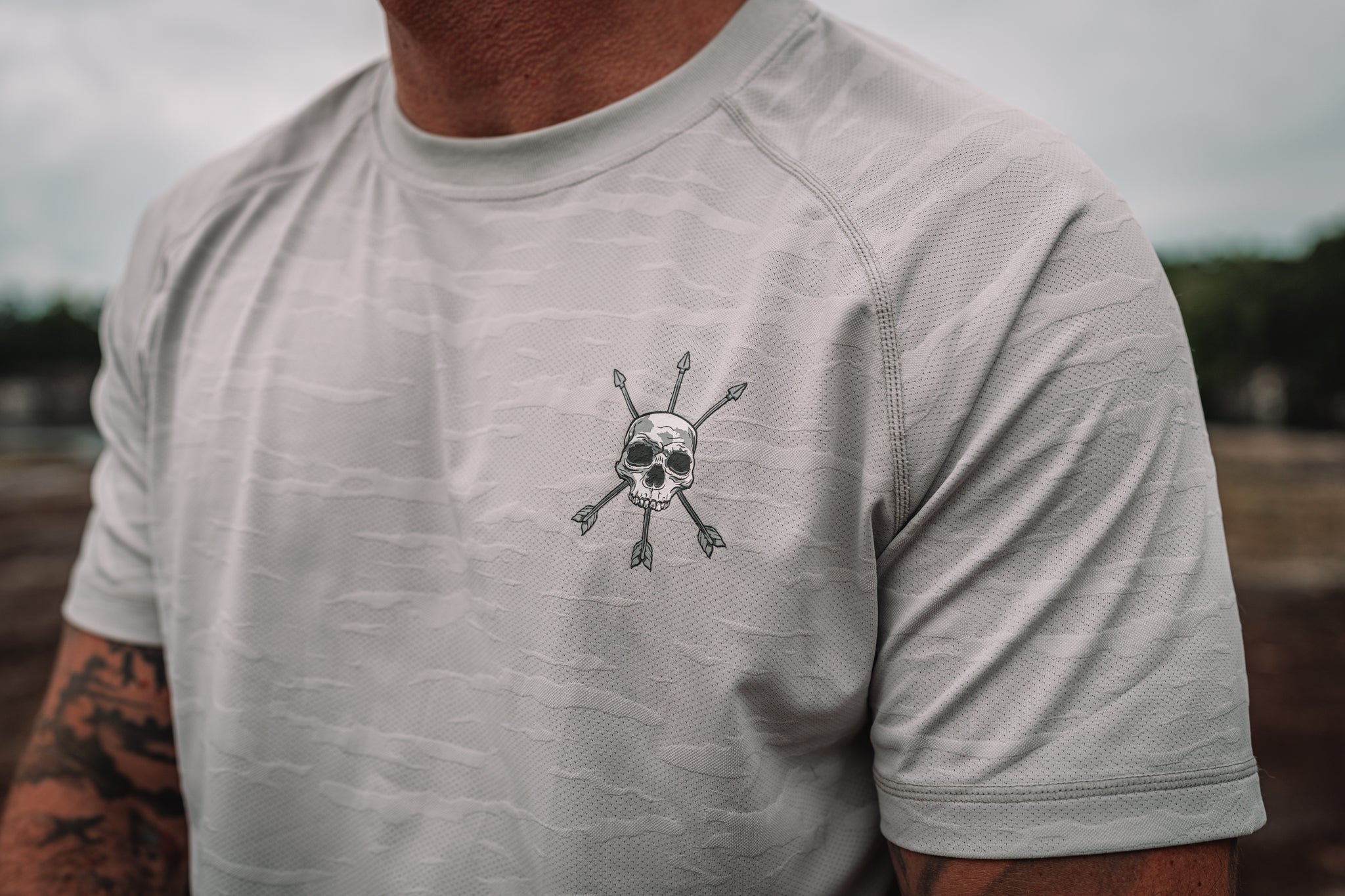 The skull and arrows mark on the Drift Tee