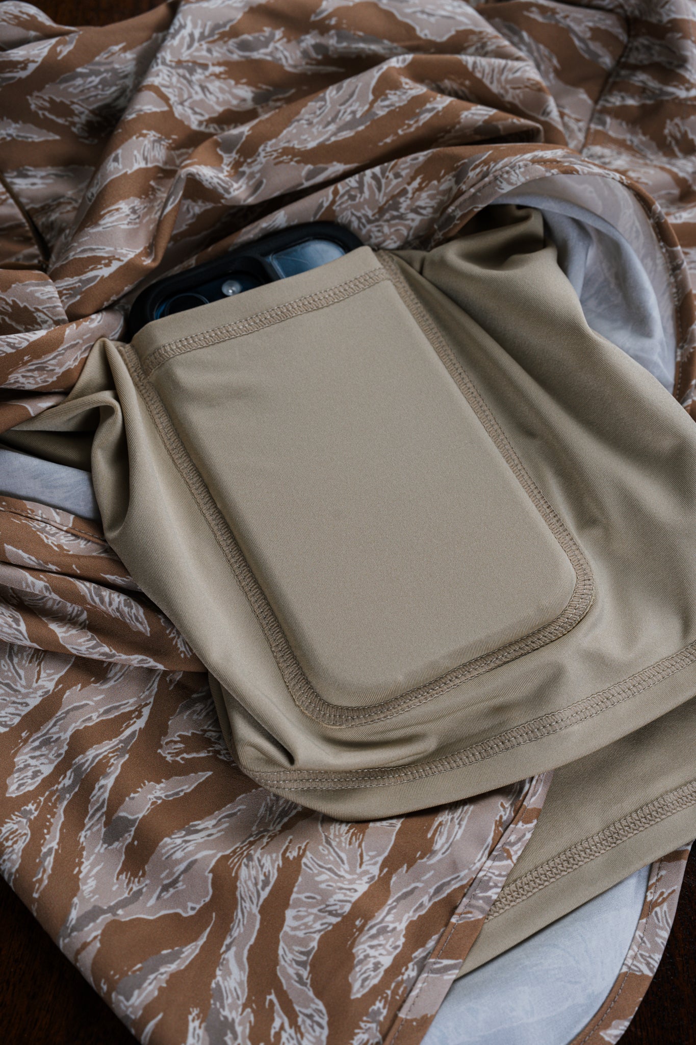 Flat lay of the compressive liner and its pocket