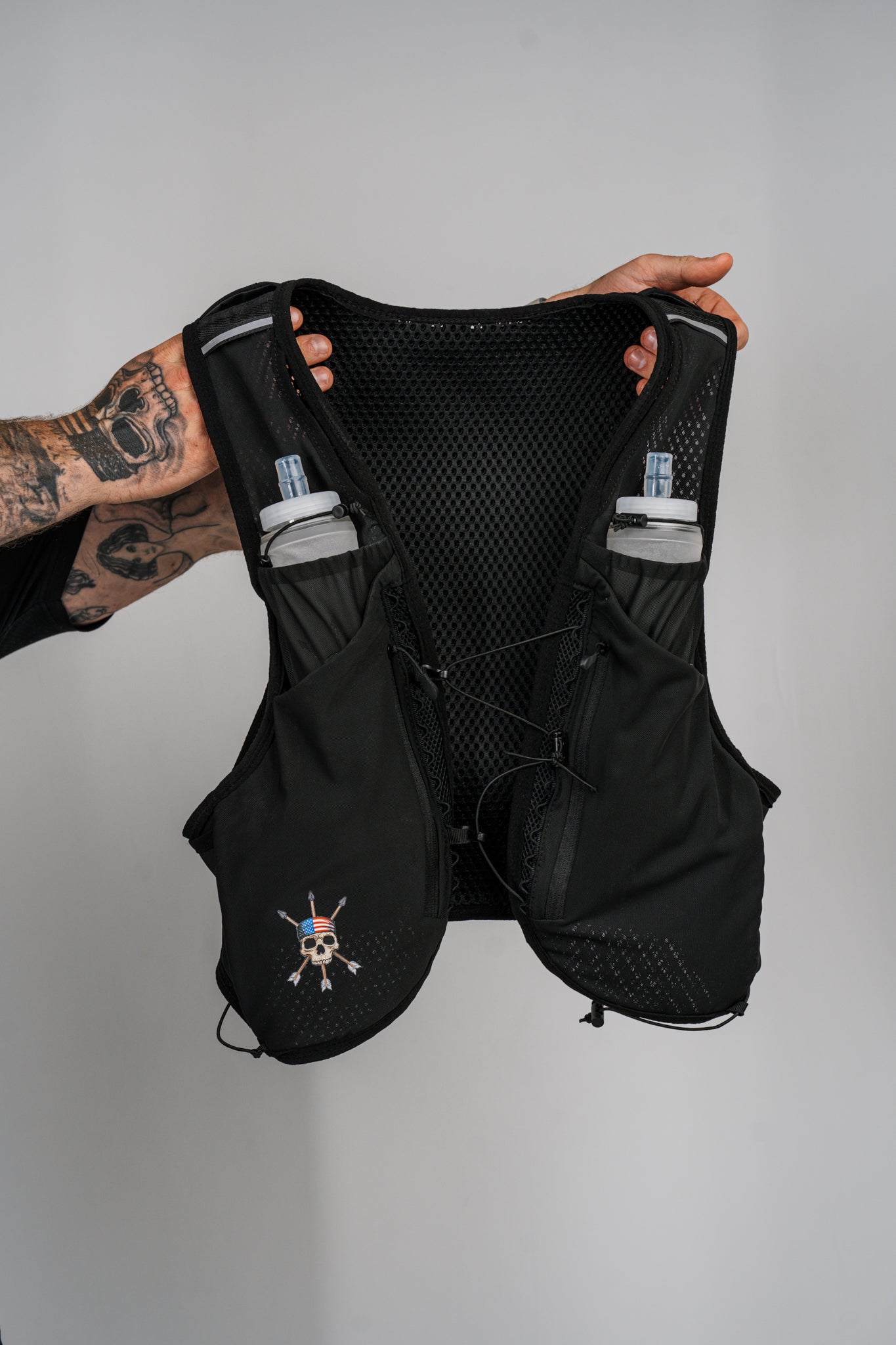 Ridgeline Vest opened, mesh back panel and both flasks