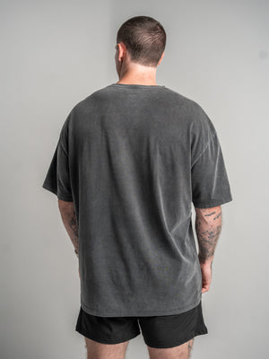 Men's oversized gym t shirt in Charcoal, back view showing longer body