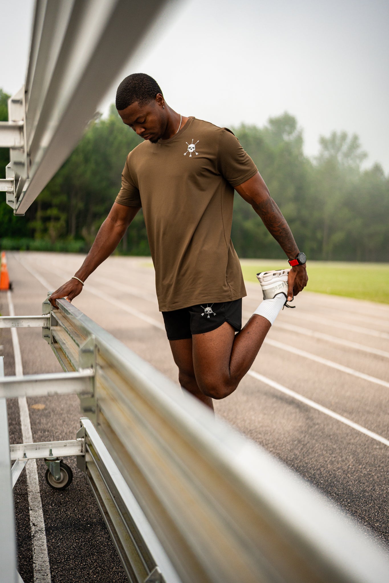 Warming up on the track in the Ascend Tee