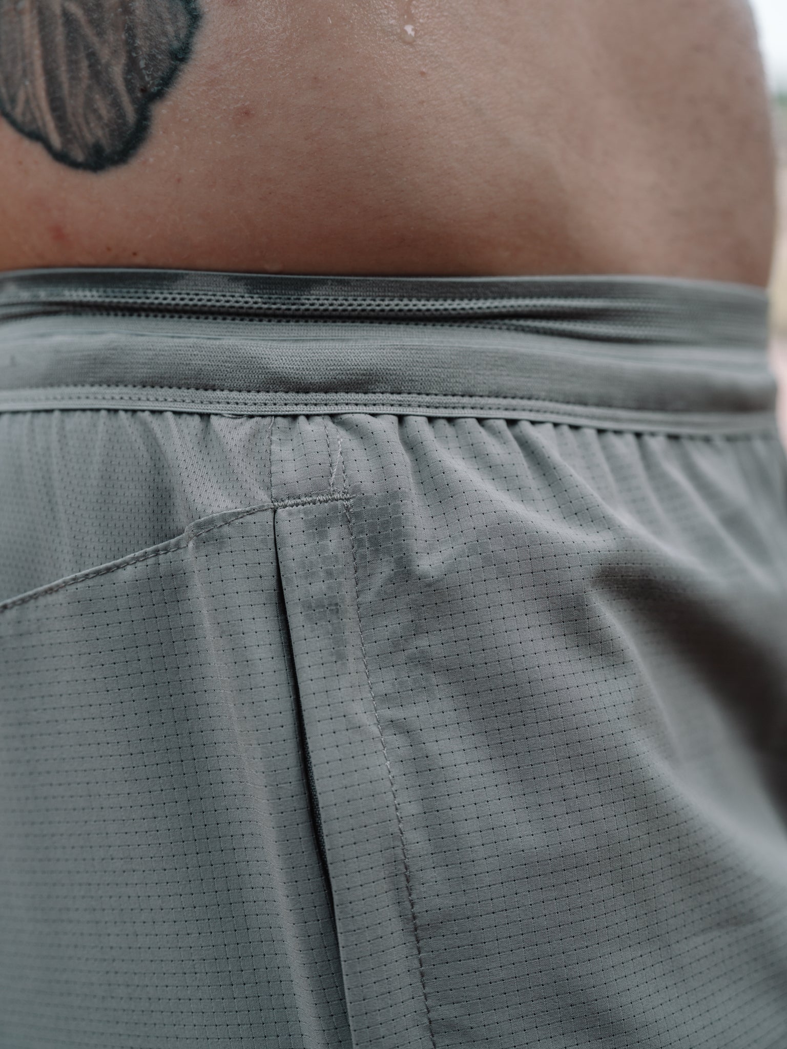 Waistband and zip pocket