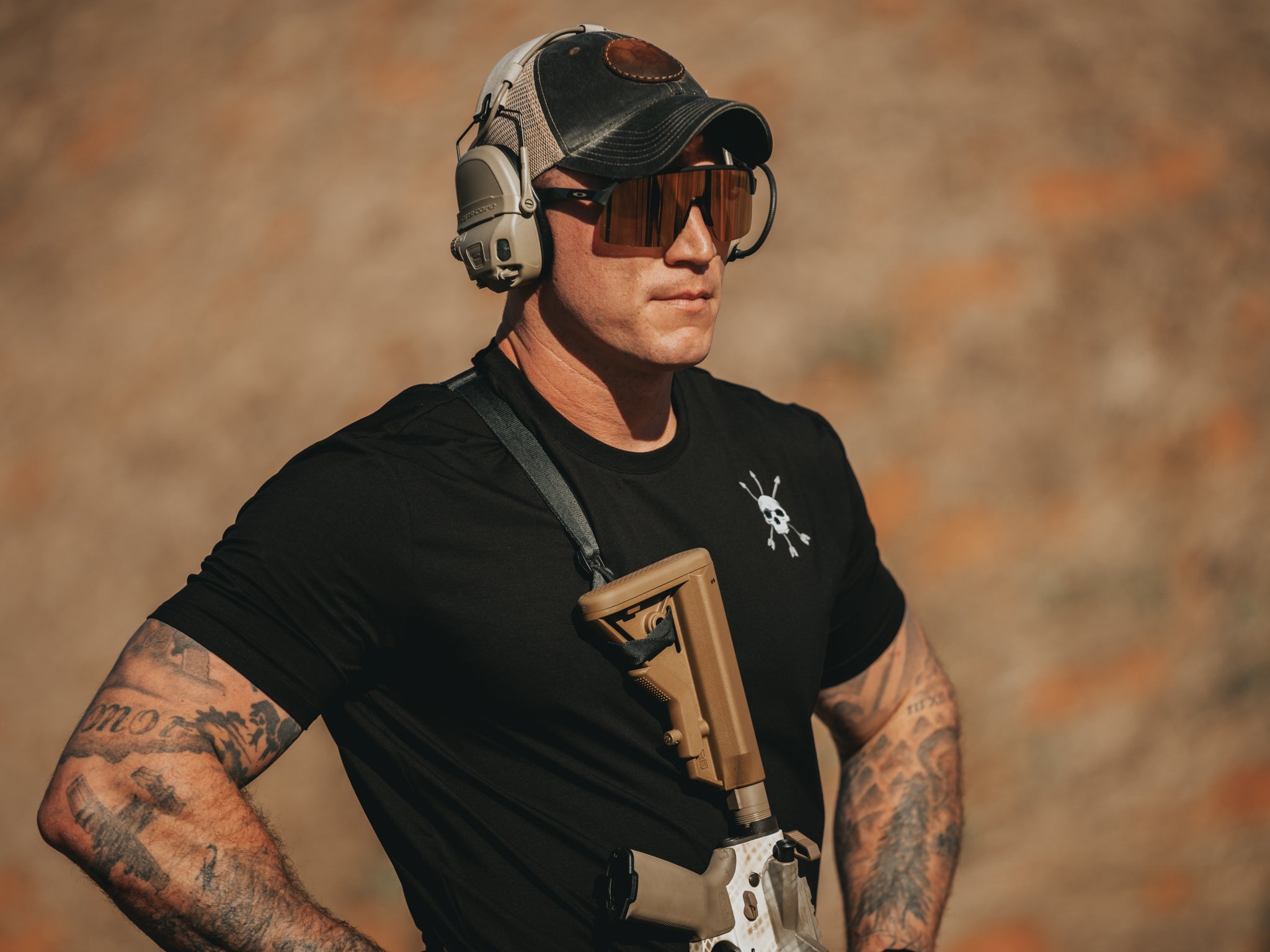 Collar and shoulder of the Raider Tee in hard sun