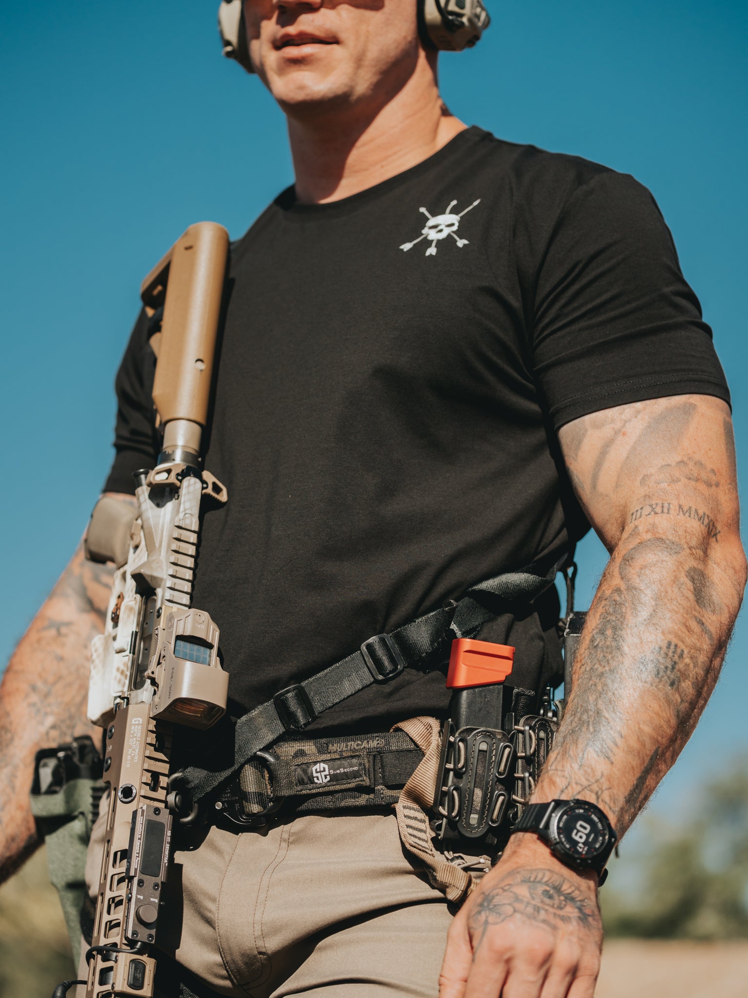 The mark on the left chest of the Raider Tee