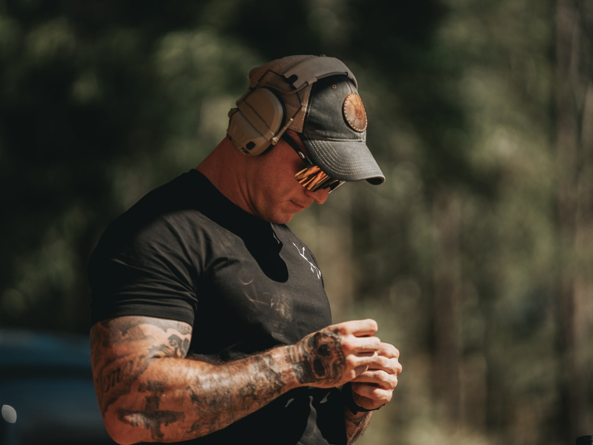 The Raider Tee soaked through after a hot day on the range
