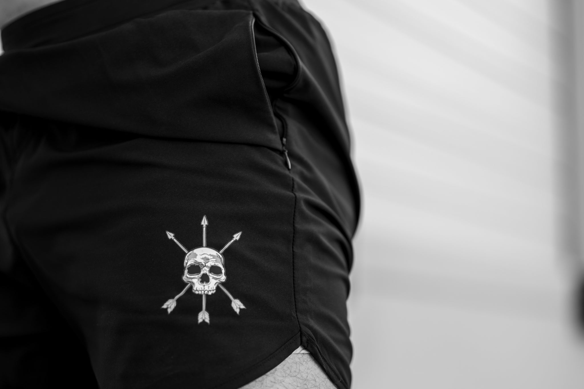 The mark and the zip side pocket up close