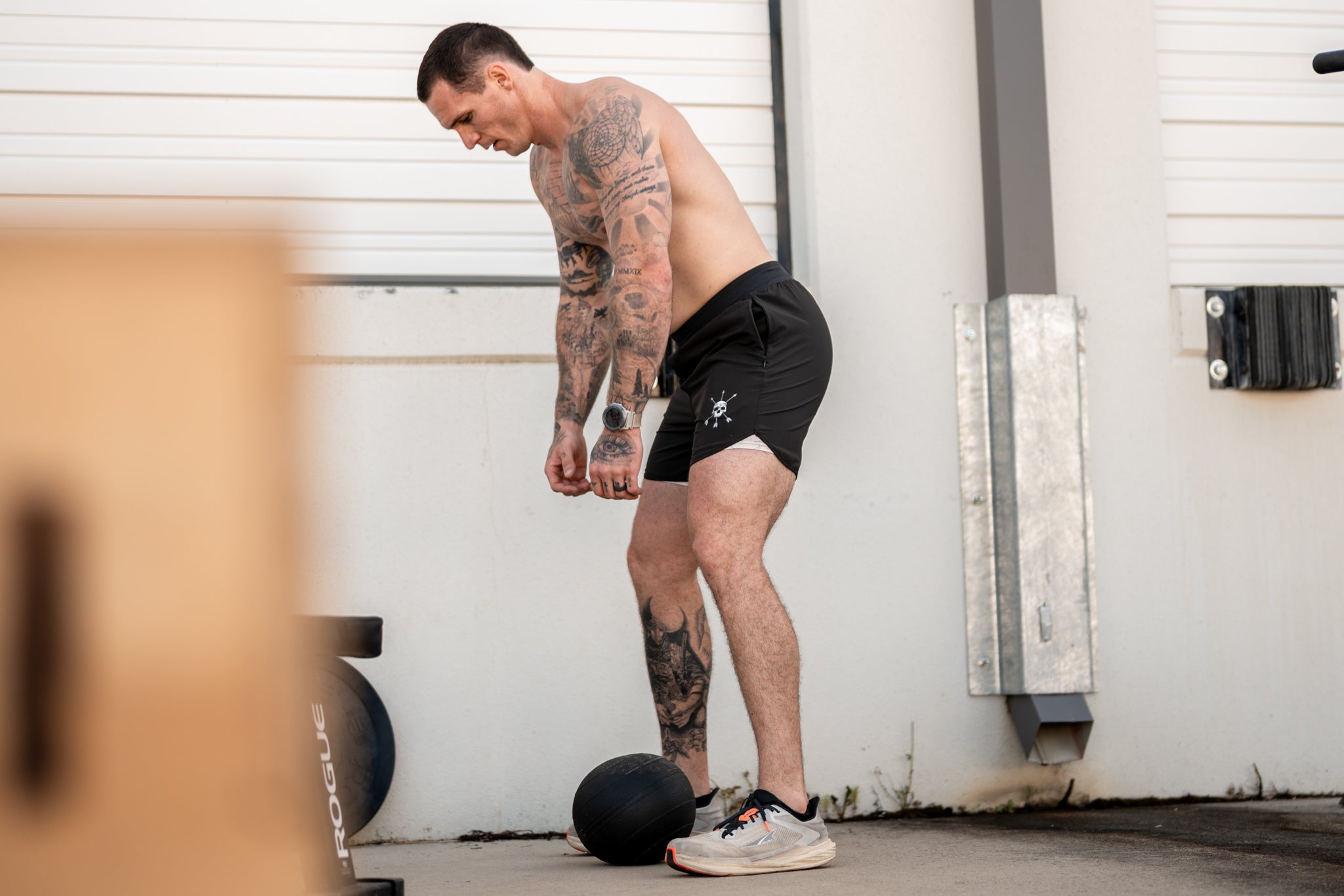 Hybrid Short in Black, full profile mid session
